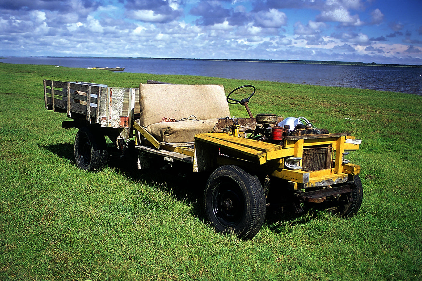 Wooden Machines presents fine art photographs of wooden vehicles created by artisanal fishermen in Mostardas, on the southern coast of Brazil. Photographed on Fuji Velvia 50 ISO film in 2001, these functional machines reveal ingenuity, sculptural beauty and a distinctive presence for architecture and interior design spaces.