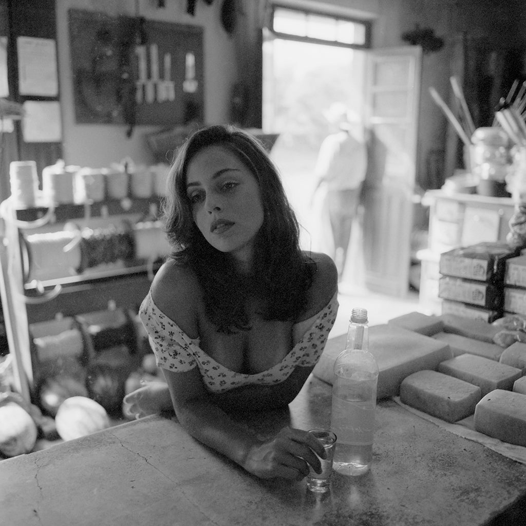 Artwork Title: Boteco, Bar and Cachaca_ 80x80cm
Series: Body Way
Artist: Marcus Luconi
Year of Capture: 2004
Location: Barra do Ouro, Maquiné, RS, Brasil
Original Medium: Negative Kodak TriX 400 ISO
Camera: Hasselblad 503 CW
Print: Fine art archival pigment print
Edition: [número da edição]