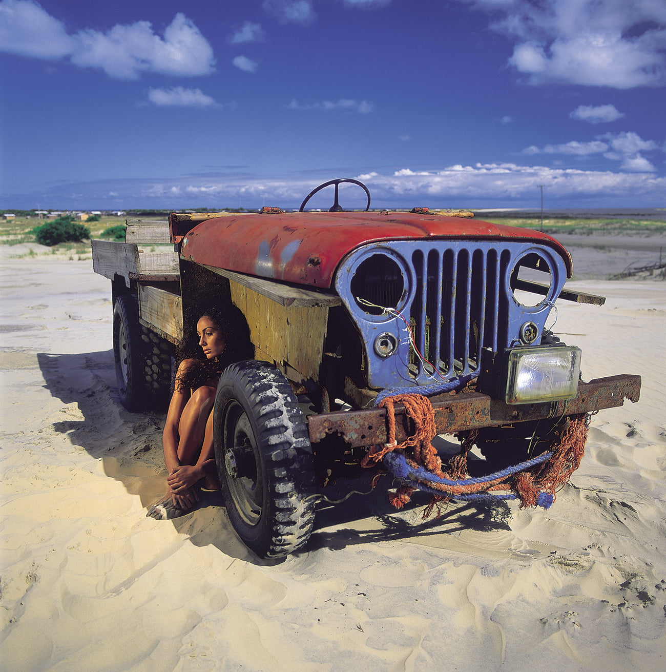 Artwork Title: n the Shadow of the Machine 100 x 100 cm
Series: Wooden Machines
Artist: Marcus Luconi
Year of Capture: 2001
Location: Mostardas, Rio Grande do Sul, Brazil
Original Medium: Fuji Velvia 50 ISO color transparency film
Camera: Analog cameras, including Hasselblad 503 CW
Print: Fine art archival pigment print
Certificate: Certificate of authenticity signed by the artist
Shipping: Available for national and international collectors