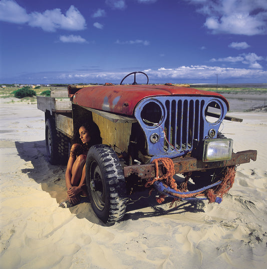 Artwork Title: n the Shadow of the Machine 100 x 100 cm
Series: Wooden Machines
Artist: Marcus Luconi
Year of Capture: 2001
Location: Mostardas, Rio Grande do Sul, Brazil
Original Medium: Fuji Velvia 50 ISO color transparency film
Camera: Analog cameras, including Hasselblad 503 CW
Print: Fine art archival pigment print
Certificate: Certificate of authenticity signed by the artist
Shipping: Available for national and international collectors