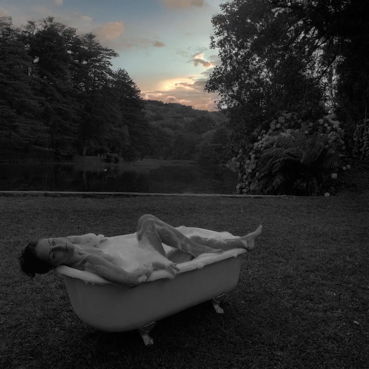 Relax During the Golden Hour — woman in a vintage bathtub surrounded by the Brazilian highland landscape, Body Way series by Marcus Luconi.