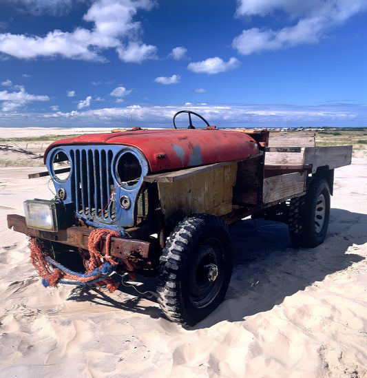 Wooden Machines presents fine art photographs of wooden vehicles created by artisanal fishermen in Mostardas, on the southern coast of Brazil. Photographed on Fuji Velvia 50 ISO film in 2001, these functional machines reveal ingenuity, sculptural beauty and a distinctive presence for architecture and interior design spaces.