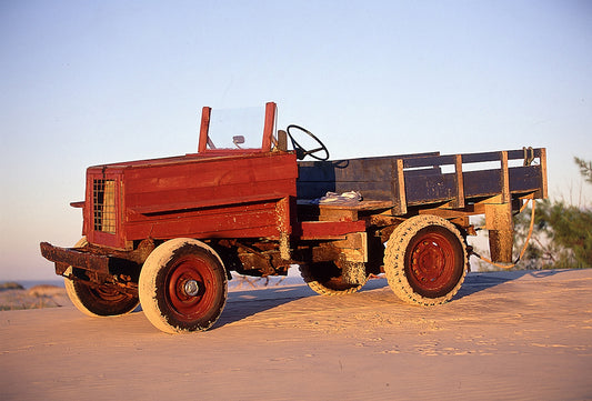Wooden Machines presents fine art photographs of wooden vehicles created by artisanal fishermen in Mostardas, on the southern coast of Brazil. Photographed on Fuji Velvia 50 ISO film in 2001, these functional machines reveal ingenuity, sculptural beauty and a distinctive presence for architecture and interior design spaces.